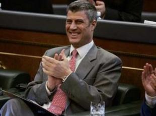 Newly elected Kosovo Prime Minister Hashim Thaci claps at a session of the Kosovo parliament in Pristina January 9, 2008. REUTERS/Hazir Reka 