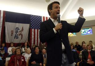 U.S. Democratic Presidential candidate and former Senator John Edwards (D-NC) shakes his fist as he campaigns at the Friendship Haven Celebration Center in Fort Dodge, Iowa January 1, 2008.(Xinhua/Reuters File Photo)