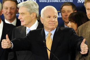 Arizona Senator and U.S. Republican presidential hopeful John McCain (C) makes thumb-up sign as he celebrates winning the contests in Potomac Primary, at Alexandria, VA, on Feb. 12, 2008. McCain beat his opponent during the presidential nomination contests held in the so-called "Potomac primaries" on Tuesday -- named for the river that separates Virginia and Maryland and flows past the nation's capital.(Xinhua Photo)