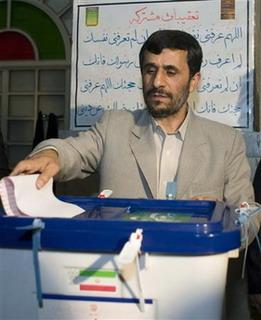 Iranian President Mahmoud Ahmadinejad casts his ballot in the parliamentary elections at a mosque in south Tehran March 14, 2008.(Raheb Homavandi/Reuters) 