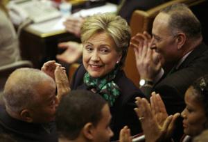 Democratic presidential candidate Senator Hillary Clinton applauds during the inauguration of New York State Governor David Paterson as the 55th state governor at the state capitol building in Albany, New York Mar. 17, 2008. (Xinhua/Reuters Photo)