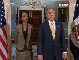 US President Bush(R), accompanied by Secretary of State Condoleezza Rice, offered sympathy to families of soldiers killed. (CCTV.com)