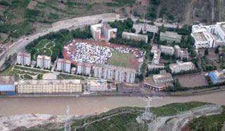 A picture taken from a helicopter Wednesday shows the view of Wenchuan County, the epicenter of Monday's earthquake that jolted southwest China's Sichuan Province. (Xinhua Photo)