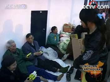 The city stadium has become the temporary shelter for local residents. Over 10,000 people have spent the first night here after Monday's earthquake.