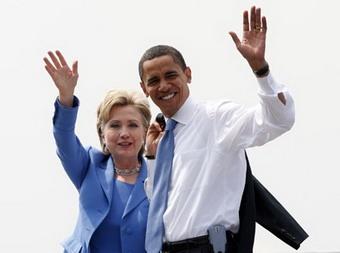U.S. Democratic presidential candidate Senator Barack Obama and Senator Hillary Clinton wave as they step off a plane in Manchester, New Hampshire June 27, 2008. (Xinhua/Reuters Photo)