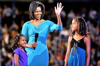 Michelle Obama, wife of Barack Obama, waves to the crowd with her daughters Malia (R) and Sasha during the Democratic National Convention in Denver, Monday, Aug. 25, 2008. Democratic current and former officials, lawmakers, prominent figures and voters vowed their support for Barack Obama's bid for the White House as the Democratic National Convention kicked off on Monday in Denver, Colorado.  (Xinhua Photo)