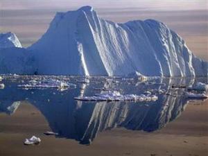 An iceberg carved from a glacier floats in the Jacobshavn fjord in south-west Greenland in this undated handout photograph released on September 20, 2006.(Konrad Steffen/University of Colorado/Handout/Reuters)