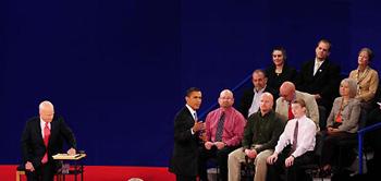Democratic presidential candidate Sen.Barack Obama (C) speaks during the debate with Republican presidential candidate Sen.John McCain (L) at the Town Hall Presidential Debate at Belmont University's Curb Event Center October 7,2008 in Nashville,Tennessee.The debate is the second presidential debate of three.(Xinhua/Zhang Yan)