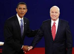 Democratic presidential candidate Sen.Barack Obama (L) shakes hands with Republican presidential candidate Sen.John McCain during the Town Hall Presidential Debate at Belmont University's Curb Event Center October 7,2008 in Nashville,Tennessee.The debate is the second presidential debate of three.(Xinhua/Zhang Yan)