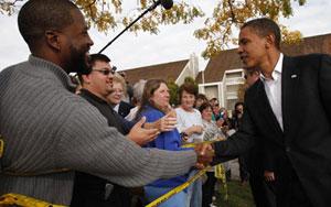 U.S. Democratic presidential nominee Senator Barack Obama greets potential voters at his hotel at the Maumee Bay Resort in Oregon, Ohio, October 15, 2008.(Xinhua/Reuters Photo)