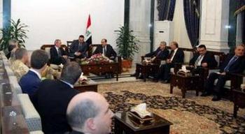 Iraqi Prime Minister Nuri al-Maliki (5th R) meets Britain's new Defence Secretary John Hutton (7th R) during his visit to Baghdad October 19, 2008.REUTERS/Iraqi Government/Handout(IRAQ)
