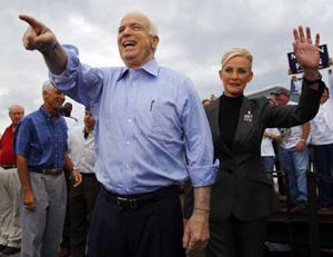 U.S. Republican presidential nominee Senator John McCain (R-AZ) and his wife Cindy wave to supporters at a campaign stop at All Star Building Materials in Ormond Beach, Florida October 23, 2008.(Xinhua/Reuters Photo)