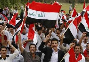 Students chant anti-U.S. slogans as they wave Iraqi national flags during a protest at the University of Mustansiriya in Baghdad October 28, 2008.REUTERS/Thaier al-Sudani