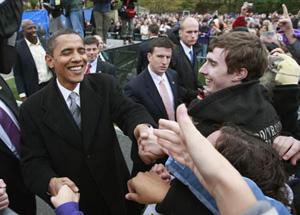 U.S. Democratic presidential nominee Senator Barack Obama greets supporters during a campaign rally in Harrisonburg, Virginia, October 28, 2008.(Xinhua/Reuters Photo)