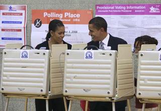 U.S. Democratic presidential nominee Senator Barack Obama (D-IL) and his wife Michelle vote in the U.S. presidential election at the Beulah Shoesmith Elementary School in Chicago, Nov. 4, 2008.(Xinhua/Reuters Photo)
