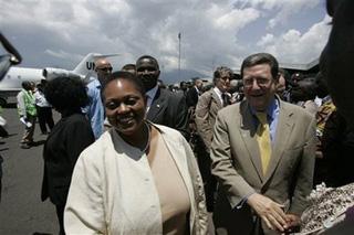 The top U.S. envoy for Africa, Jendayi Frazer,left, and Alan Doss, right, the top U.N. envoy in Congo great dignitaries as they arrive at Goma airport, Friday , Oct. 31, 2008.(AP Photo/Karel Prinsloo)