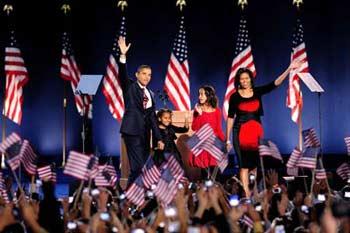 U.S. Democratic presidential candidate Senator Barack Obama (L) celebrates with his family after he won the U.S. presidential election in Chicago on Tuesday night, Nov. 4, 2008.(Xinhua Photo)