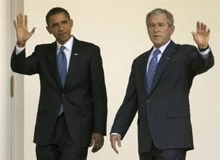 U.S. President George W. Bush walks with President-elect Barack Obama during a visit to the White House in Washington, November 10, 2008. Obama visited the White House on Monday for his first post-election meeting with President George W. Bush, a strikingly symbolic moment in the transition of power.REUTERS/Kevin Lamarque