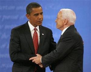 Barack Obama shakes hands with Sen. John McCain at the conclusion of the presidential debate at Hofstra University in Hempstead, New York, October 15, 2008.(Jim Bourg/Reuters)