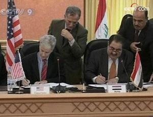 The US and Iraq have signed a security pact, extending the presence of US forces in Iraq for three years.(CCTV.com)