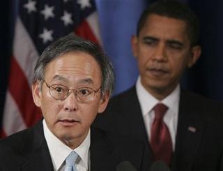 President-elect Barack Obama listens as Energy Secretary nominee Steven Chu addresses the media at a news conference in Chicago, Monday, Dec. 15, 2008.(AP Photo)