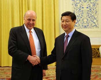 Chinese Vice President Xi Jinping (R) meets with visiting U.S. Deputy Secretary of State John Negroponte at the Great Hall of the People in Beijing, capital of China, Jan. 8, 2009.(Xinhua/Rao Aimin)