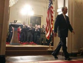 U.S. President George W. Bush walks from the podium in the White House East Room at the end of his prime time live television address to the nation in Washington January 15, 2009. Bush on Thursday defended his actions to avert a collapse of the financial system and protect America from another terrorist attack as he mounted a farewell bid to polish his troubled legacy.REUTERS/Jason Reed (UNITED STATES)
