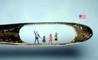 This undated image provided by UKFineArts Tuesday Jan. 20 2009, shows a micro sculpture by Willard Wigan showing U.S. President Barrack Obama and his family in the eye of a needle.(Xinhua/AFP Photo)