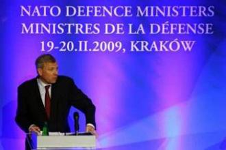 NATO Secretary General Jaap de Hoop Scheffer addresses reporters during his final press conference at a meeting of NATO defence ministers in Krakow, Southern Poland February 20, 2009.REUTERS/Pawel Kopczynski