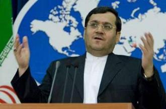 Iran's Foreign Ministry spokesman Hassan Qashqavi speaks to journalists during a news conference in Tehran February 23, 2009.REUTERS/Raheb Homavandi