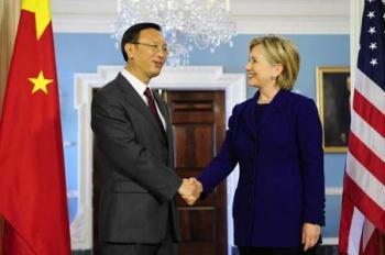 U.S. Secretary of State Hillary Clinton (R) shakes hands with visiting Chinese Foreign Minister Yang Jiechi in Washington, U.S., March 11, 2009. Yang Jiechi and Hillary Clinton held formal talks here on Wednesday to exchange views on bilateral relations and other issues of mutual concern.(Xinhua/Zhang Yan)
