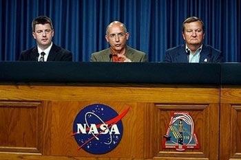 L-R: Mike Moses, Chair Mission Management Team, Mike Suffredini, International Space Station Program Manager and Mike Leinbach, Launch Director, speak to the media in Cape Canaveral, Florida. NASA will break with protocol and try to launch Discovery on Sunday even though it has yet to uncover the cause of a hydrogen leak that delayed its mission earlier in the week, officials said. AFP/Getty Images/Eliot J. Schechter) 