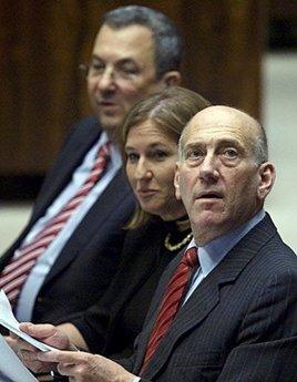 Outgoing Israeli Prime Minister Ehud Olmert (R), Foreign Minister Tzipi Livni (C) and Defense Minister Ehud Barak attend a Knesset (Israeli Parliament) session in Jerusalem. Benjamin Netanyahu is set to become Israel's new premier on Tuesday, heading a predominantly right-wing cabinet that has sparked international concern over the future of troubled peace talks.(AFP/Menahem Kahana)